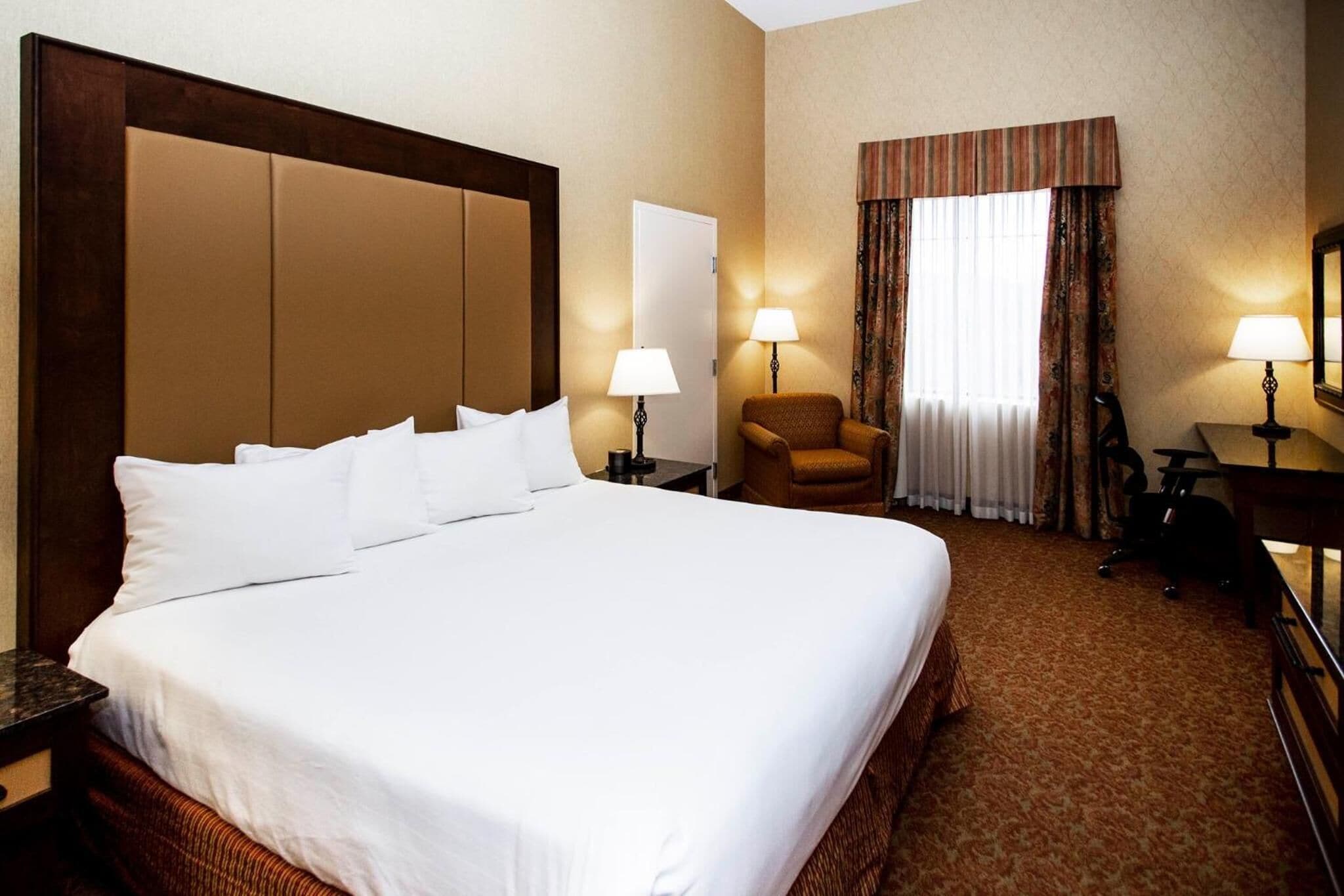 premium bedding, pillow-top beds, desk, blackout curtains