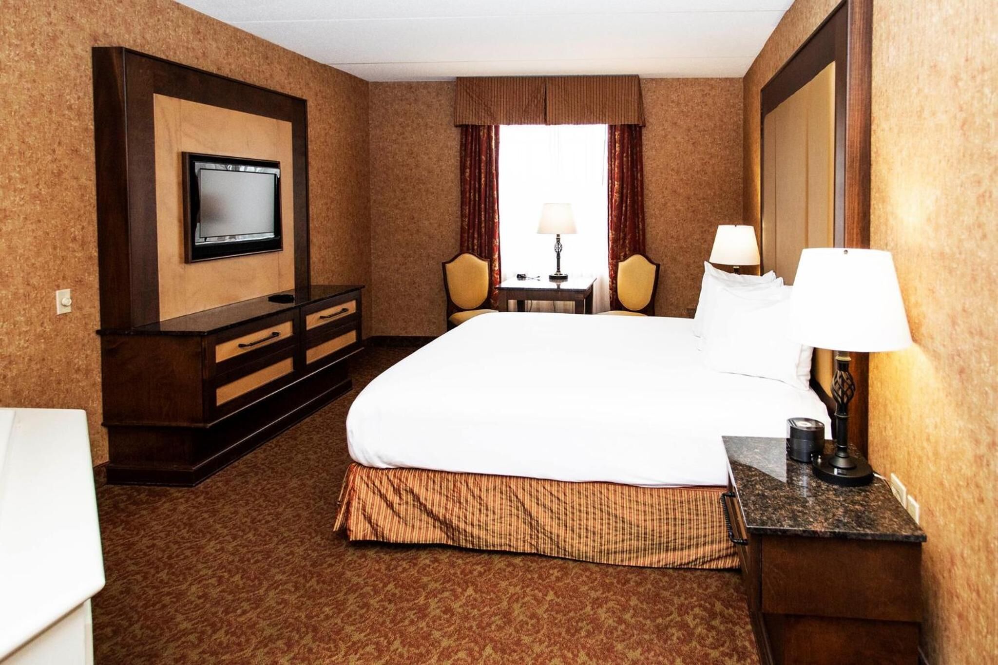 premium bedding, pillow-top beds, desk, blackout curtains