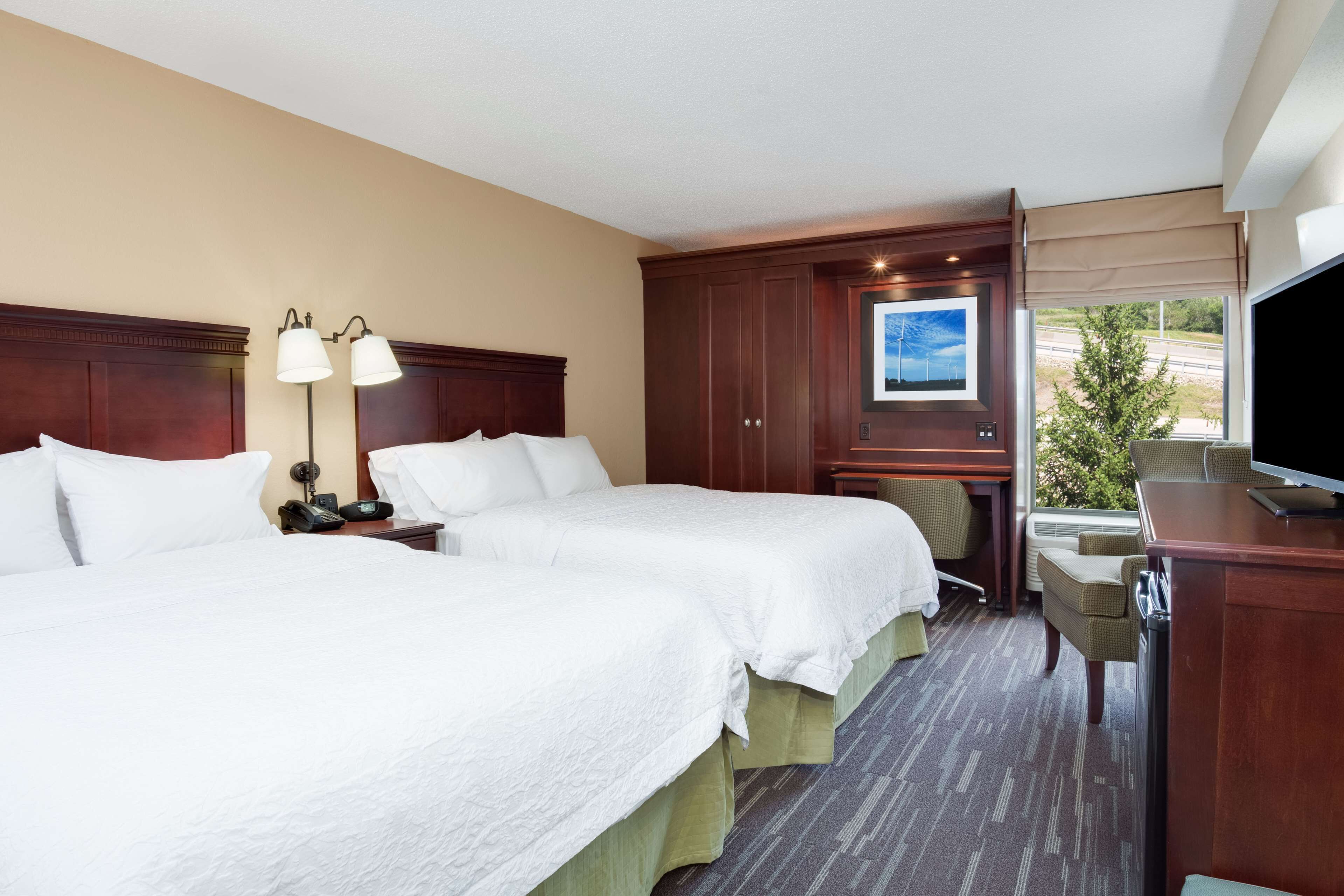 desk, blackout curtains, iron/ironing board, free cots/infant beds