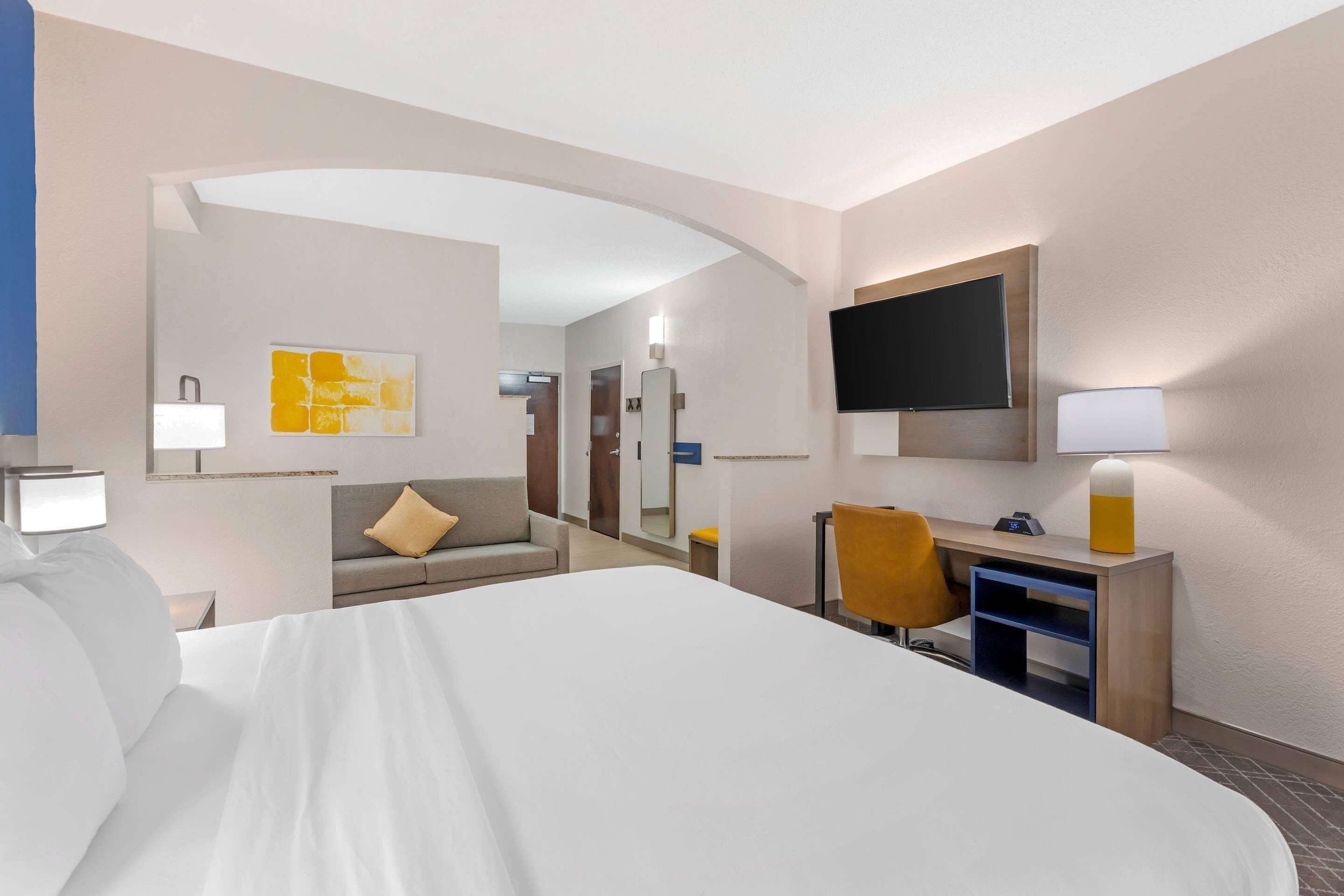 Suite, 1 King Bed with Sofa bed, Accessible, Non Smoking | In-room safe, desk, laptop workspace, iron/ironing board