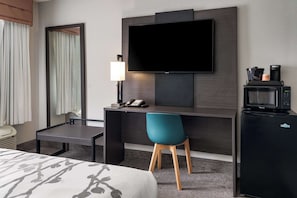 Desk, laptop workspace, blackout curtains, iron/ironing board