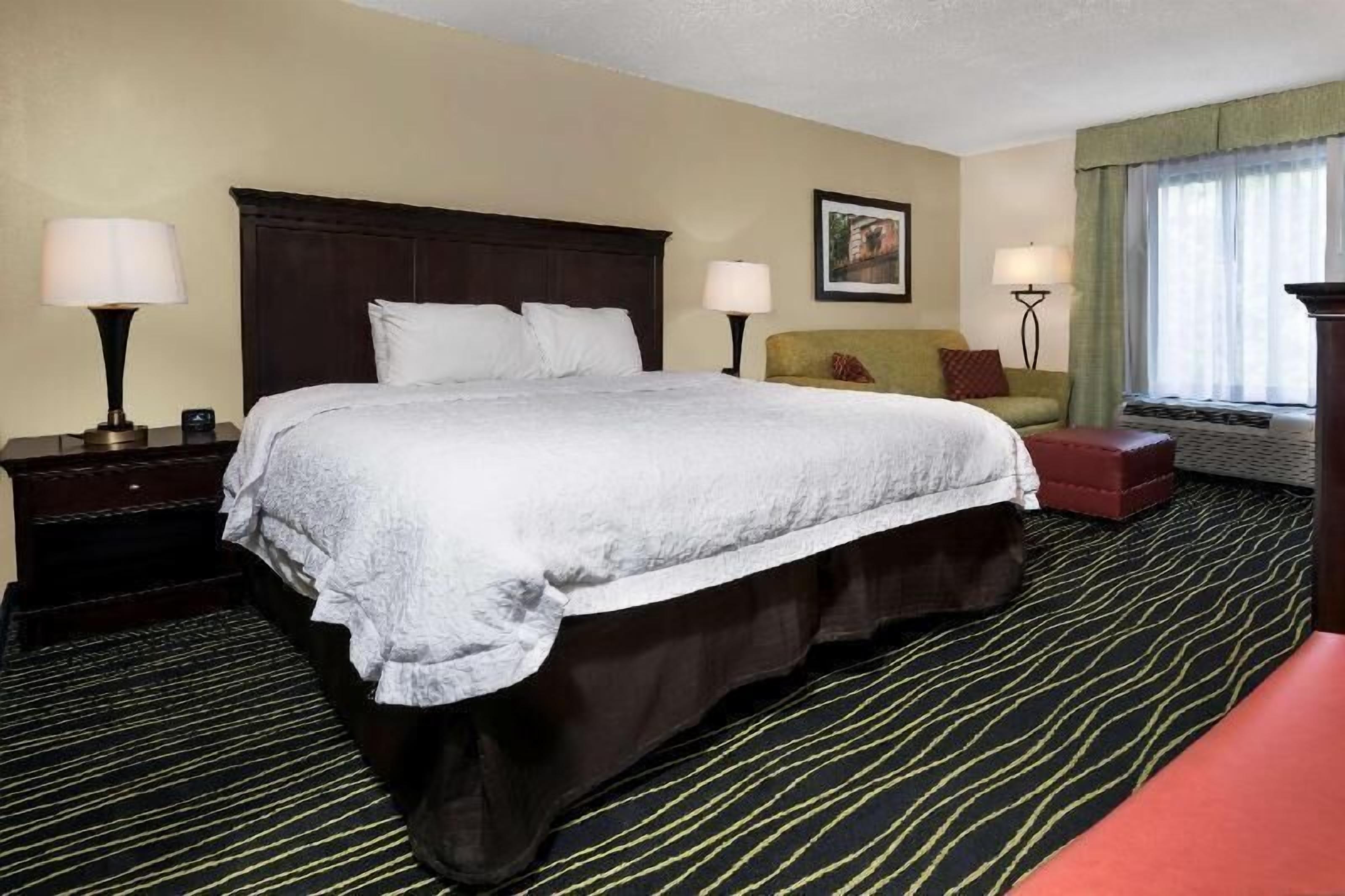 Egyptian cotton sheets, premium bedding, down comforters, in-room safe