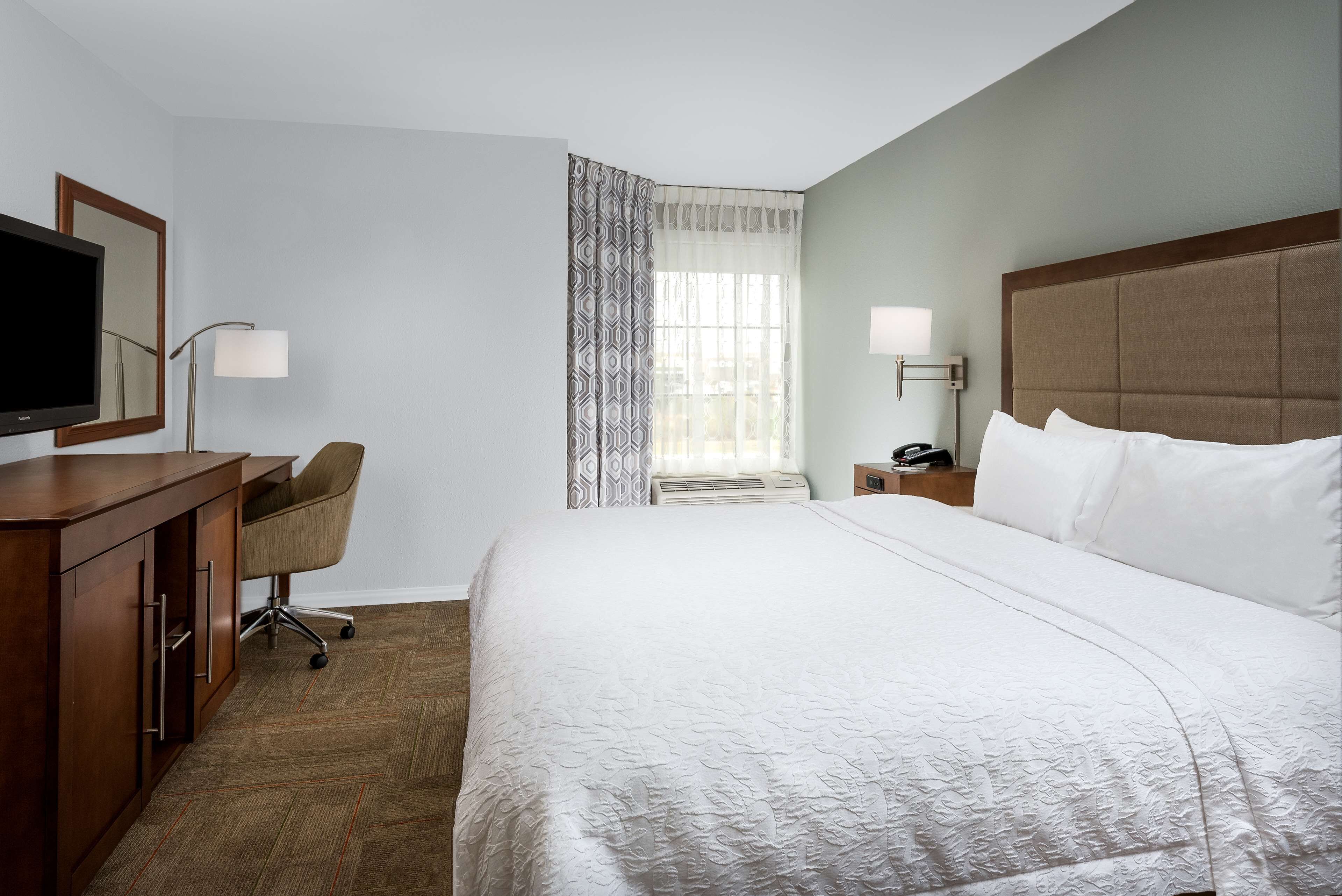 suite, 1 king bed, fireplace | in-room safe, desk, iron/ironing board, free cots/infant beds
