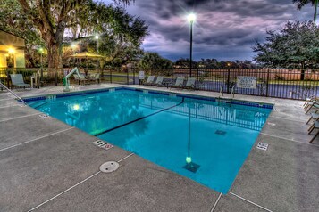 Seasonal outdoor pool, open 8:00 AM to 9:00 PM, pool loungers