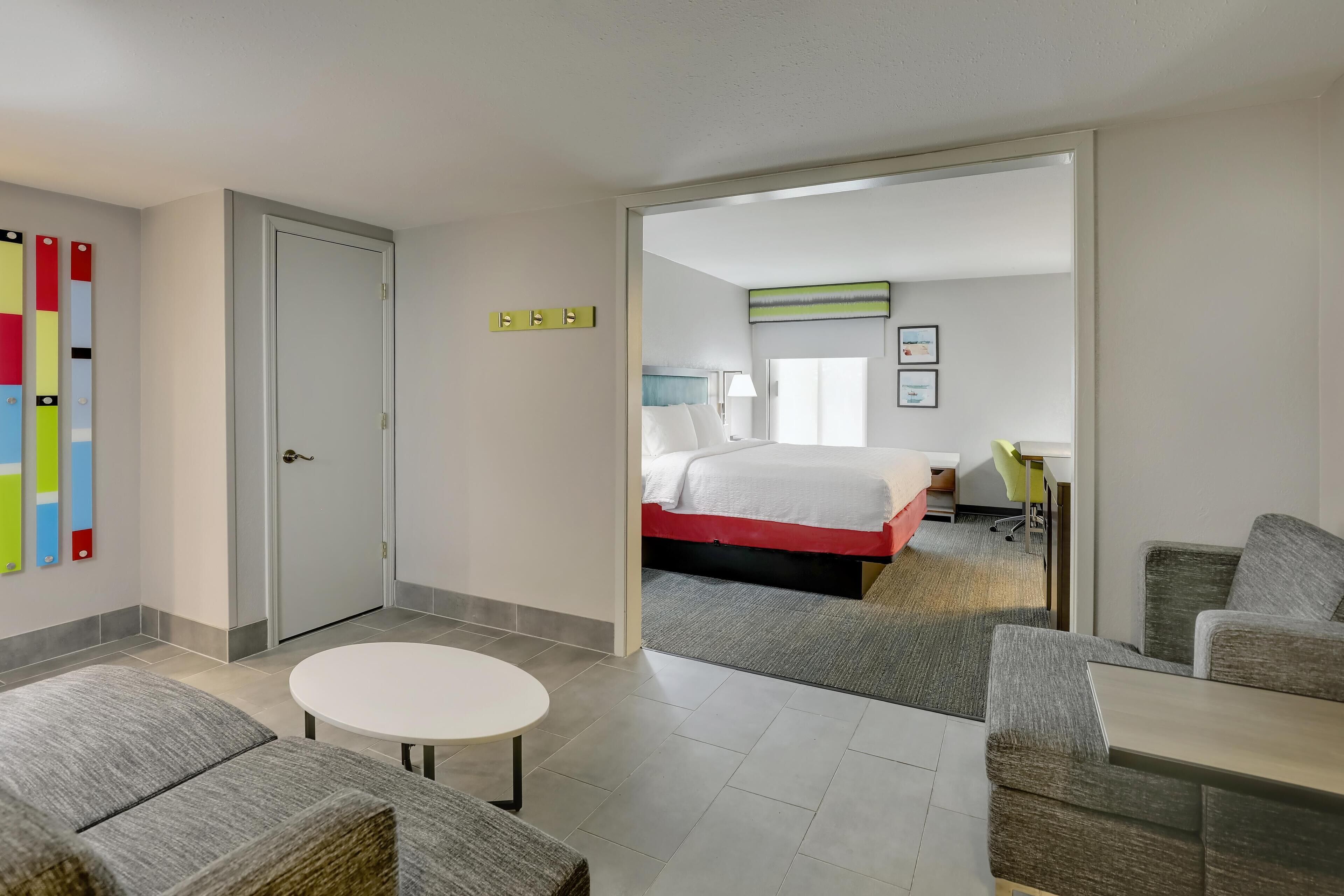 Suite, 1 King Bed, Accessible, Bathtub | Living area | 32-inch flat-screen TV with cable channels, TV, video-game console