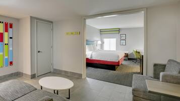 Suite, 1 King Bed, Accessible, Bathtub | Living area | 32-inch flat-screen TV with cable channels, TV, video-game console