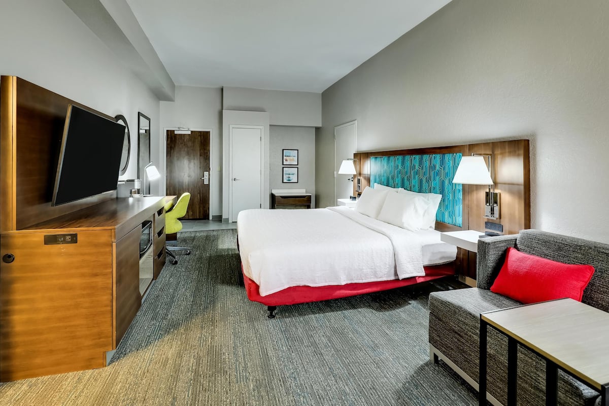 Room, 1 King Bed, Accessible (Roll-In Shower) | Premium bedding, desk, blackout drapes, iron/ironing board