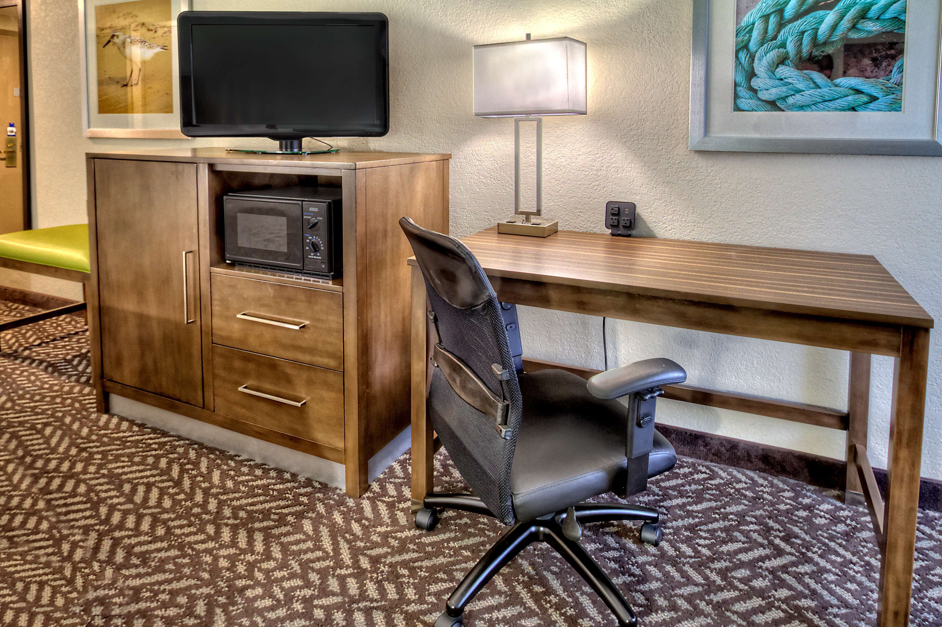 premium bedding, desk, blackout curtains, iron/ironing board