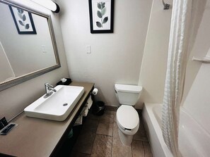 Combined shower/bathtub, free toiletries, hair dryer, towels - Radiant Inn & Suites (Murfreesboro)