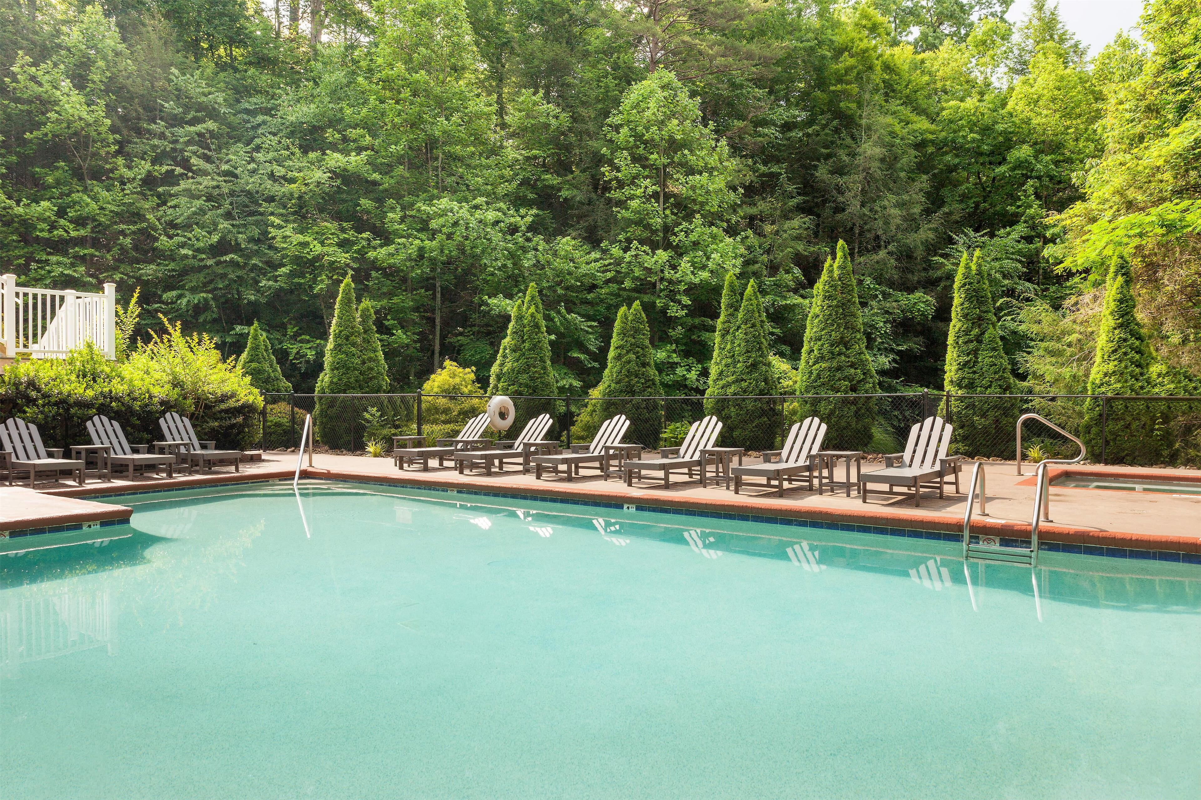 Indoor pool, outdoor pool, open 8 AM to 11 PM, pool umbrellas