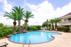 Outdoor pool, pool umbrellas, sun loungers