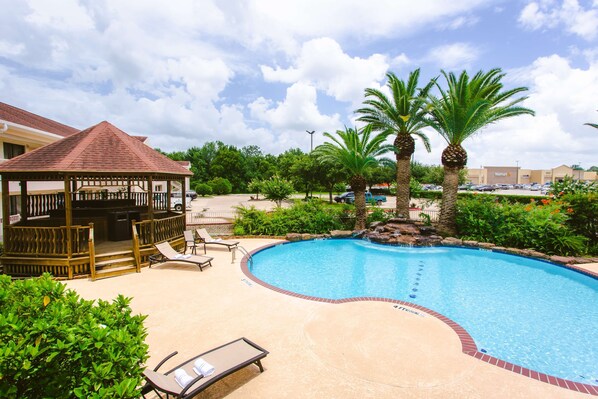 Outdoor pool, pool umbrellas, pool loungers