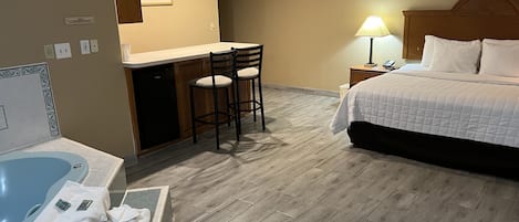 Suite, 1 King Bed, Non Smoking | In-room safe, soundproofing, free WiFi, bed sheets