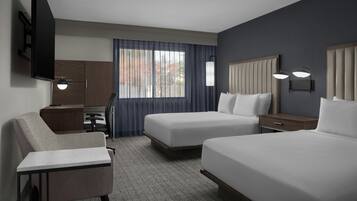 Desk, laptop workspace, blackout drapes, iron/ironing board