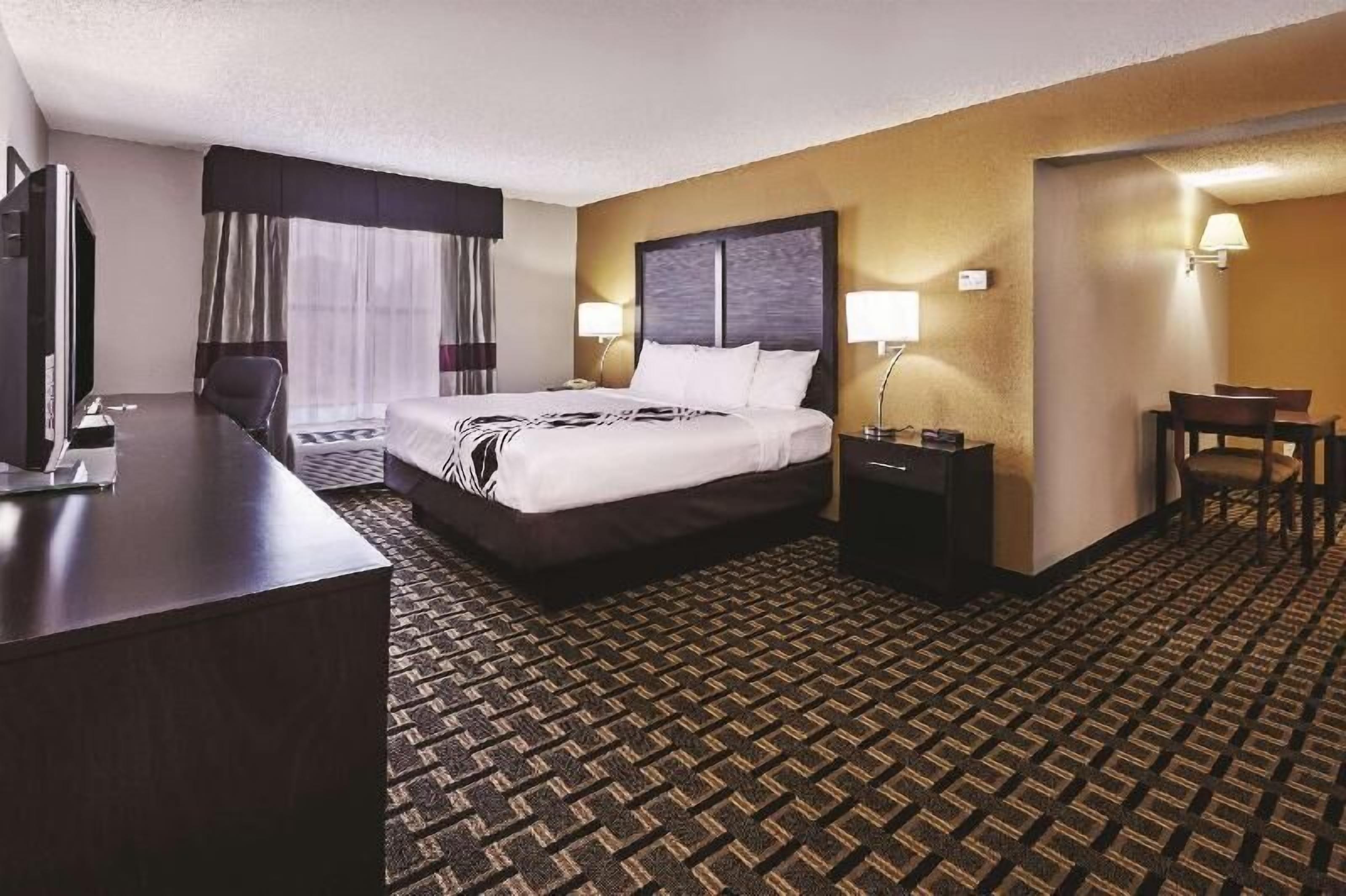 Premium bedding, pillowtop beds, desk, laptop workspace