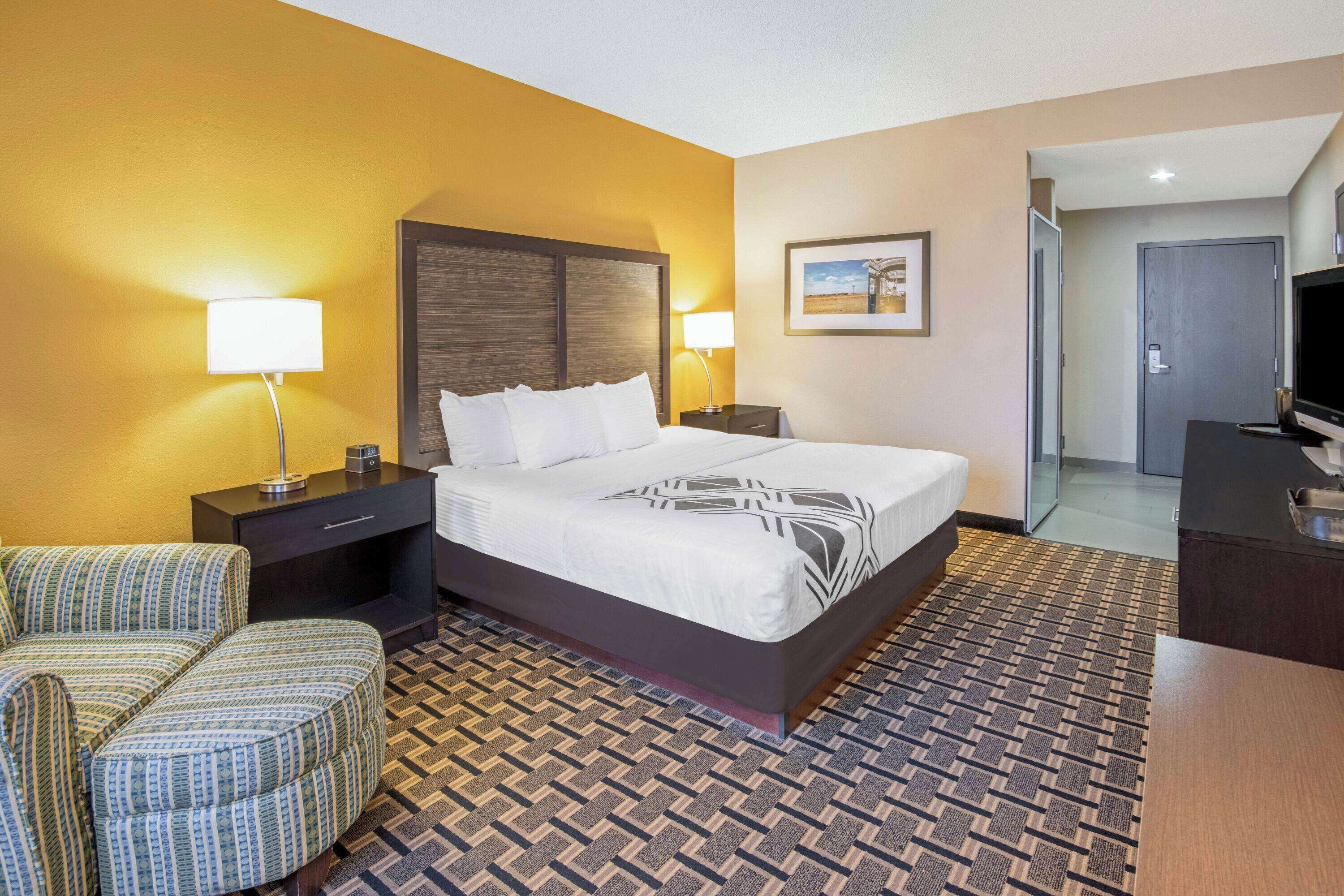 premium bedding, pillow-top beds, desk, laptop workspace