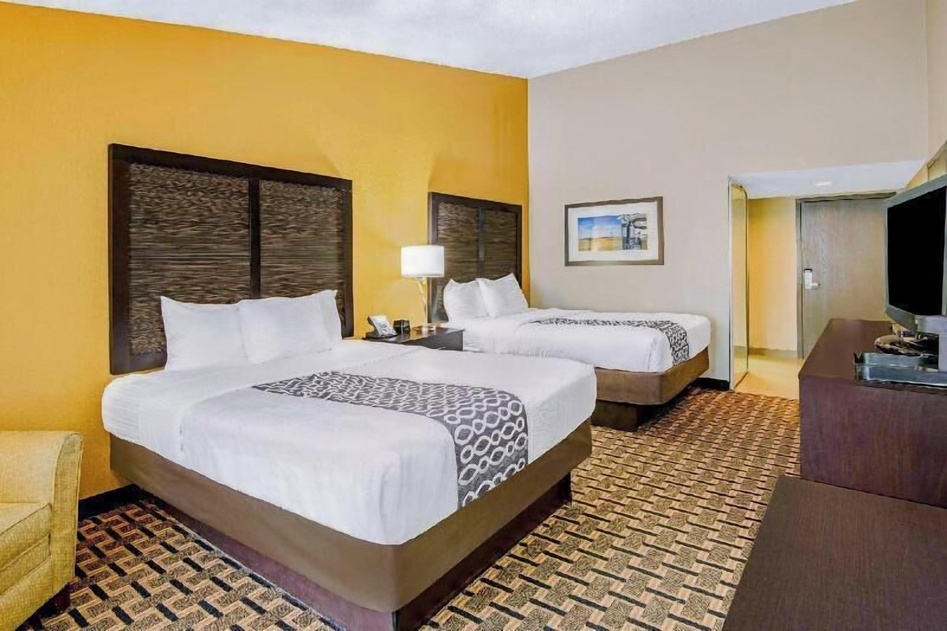 Premium bedding, pillowtop beds, desk, laptop workspace