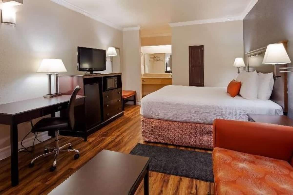 Desk, laptop workspace, blackout curtains, iron/ironing board