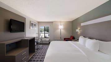 Premium bedding, pillow-top beds, desk, laptop workspace