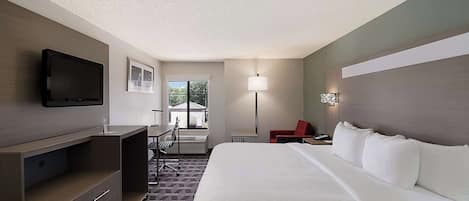Premium bedding, pillow-top beds, desk, laptop workspace