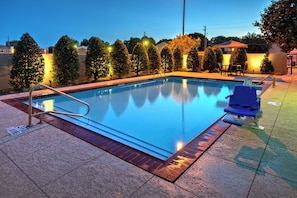 Outdoor pool, open 6:00 AM to 10:00 PM, pool umbrellas