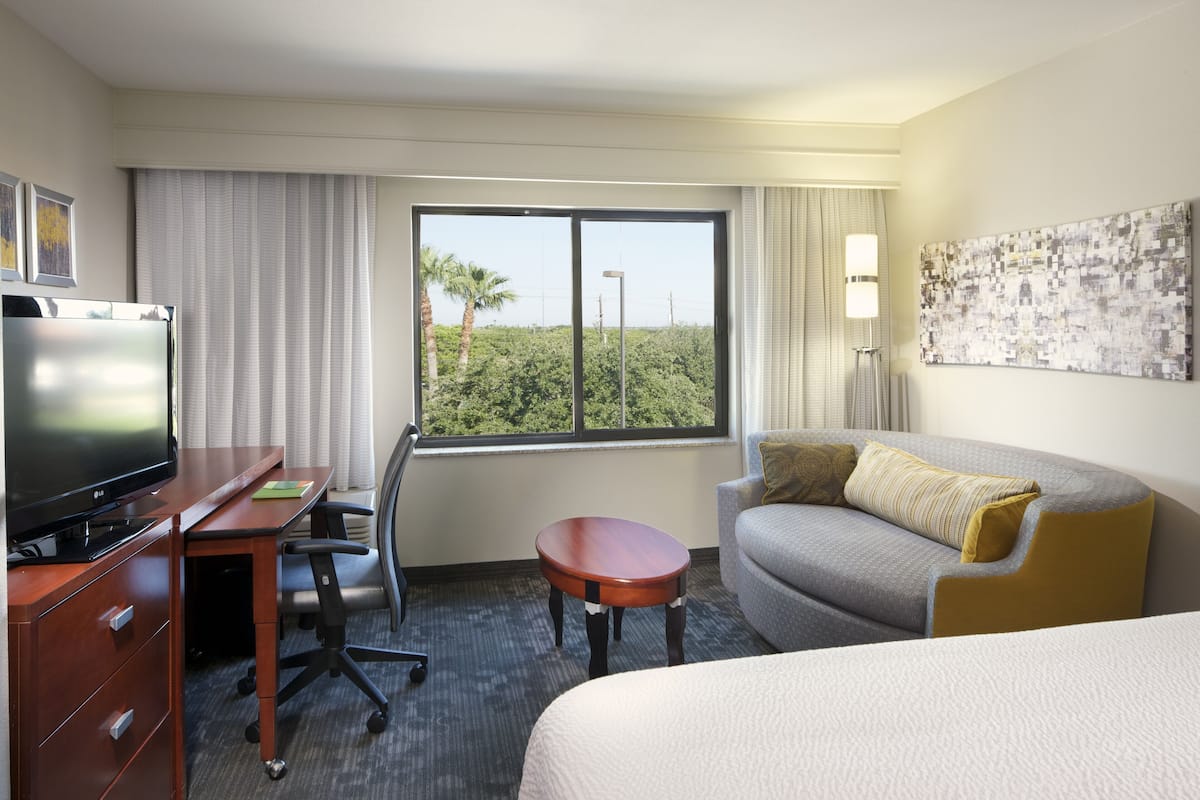 desk, laptop workspace, blackout curtains, iron/ironing board