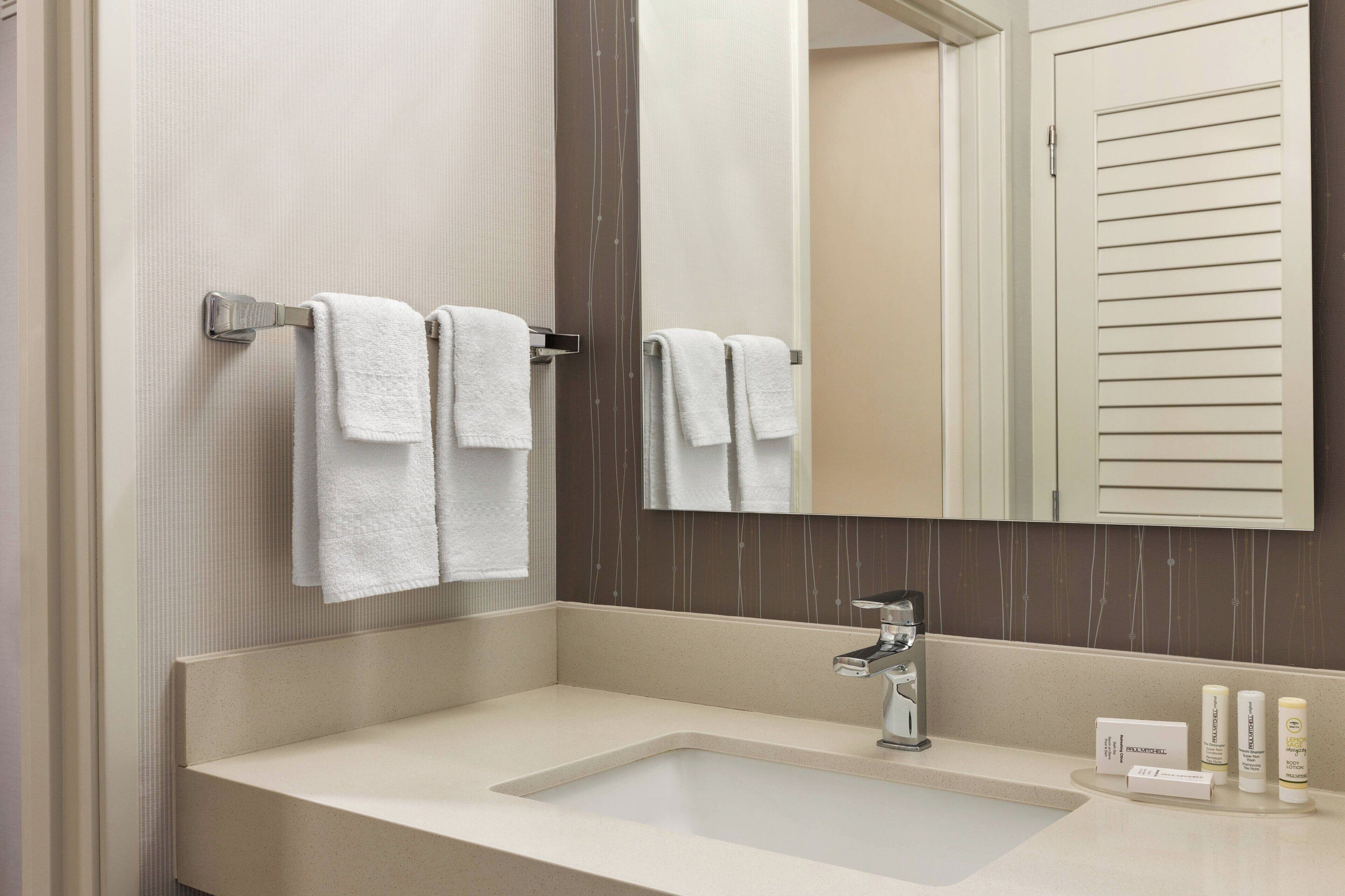 combined shower/bathtub, free toiletries, hair dryer, towels