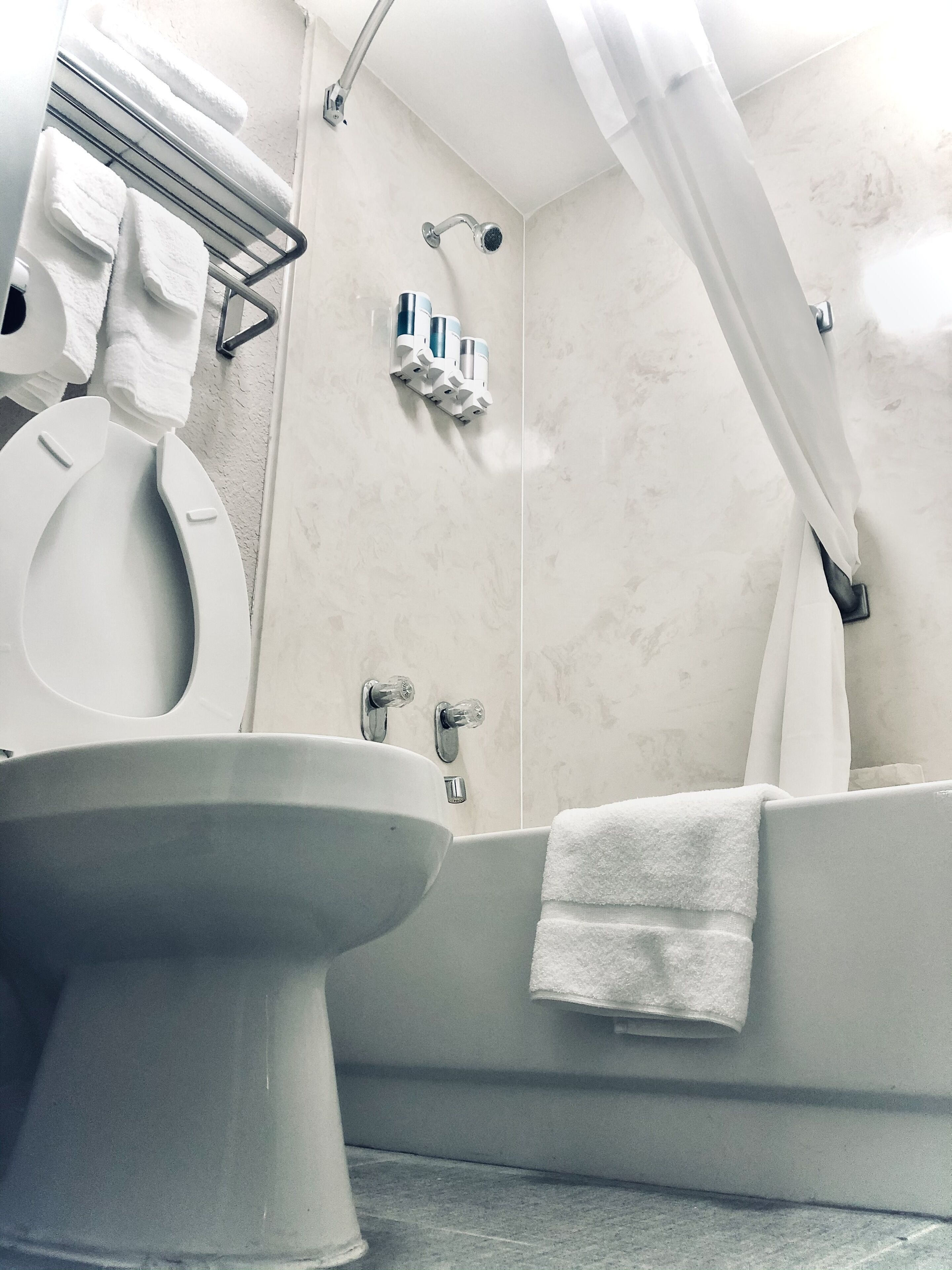 suite, 1 queen bed, non smoking | bathroom | hair dryer, towels