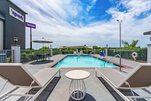 Outdoor pool, open 9:00 AM to 9:00 PM, pool umbrellas, sun loungers