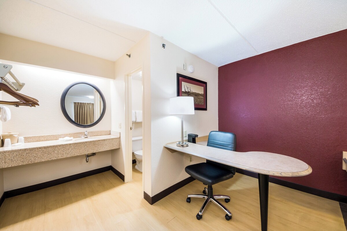 Desk, blackout drapes, WiFi (free), bed sheets