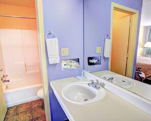 Combined shower/tub, hair dryer, towels, soap