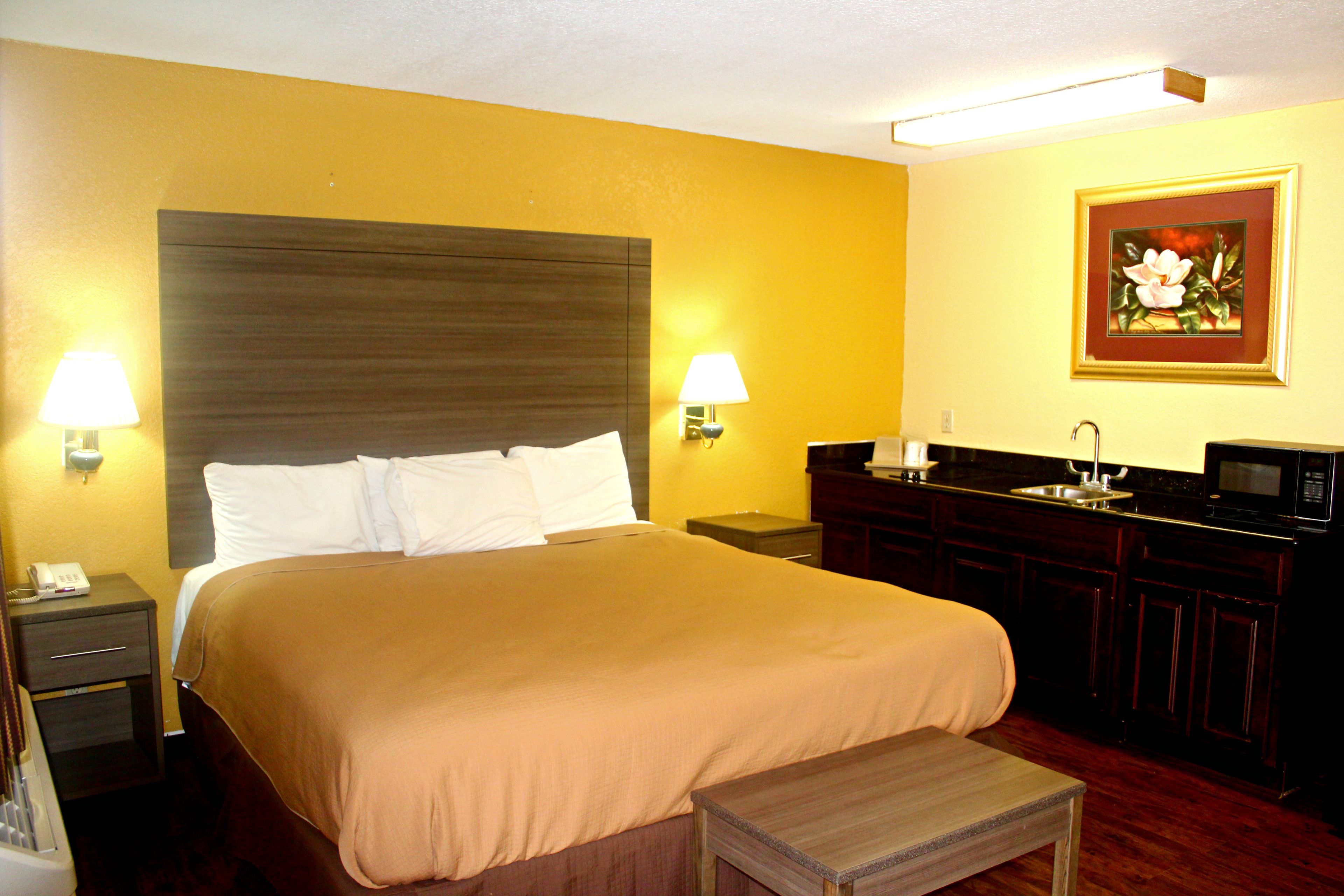 Quarto executivo, 1 cama King, para não fumantes, cozinha americana | Roupas de cama premium, escrivaninha, ferros/tábuas de passar roupa