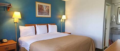 Chambre, 1 trĂšs grand lit, non-fumeur | Bureau, accĂšs au Wi-Fi (inclus), literie fournie