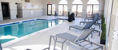 Indoor pool, open noon to 9:00 PM, pool loungers