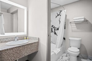 Deluxe Studio Suite, 1 King Bed, Non Smoking | Bathroom | Combined shower/tub, hair dryer, towels - Days Inn by Wyndham Dallas Plano (Plano)