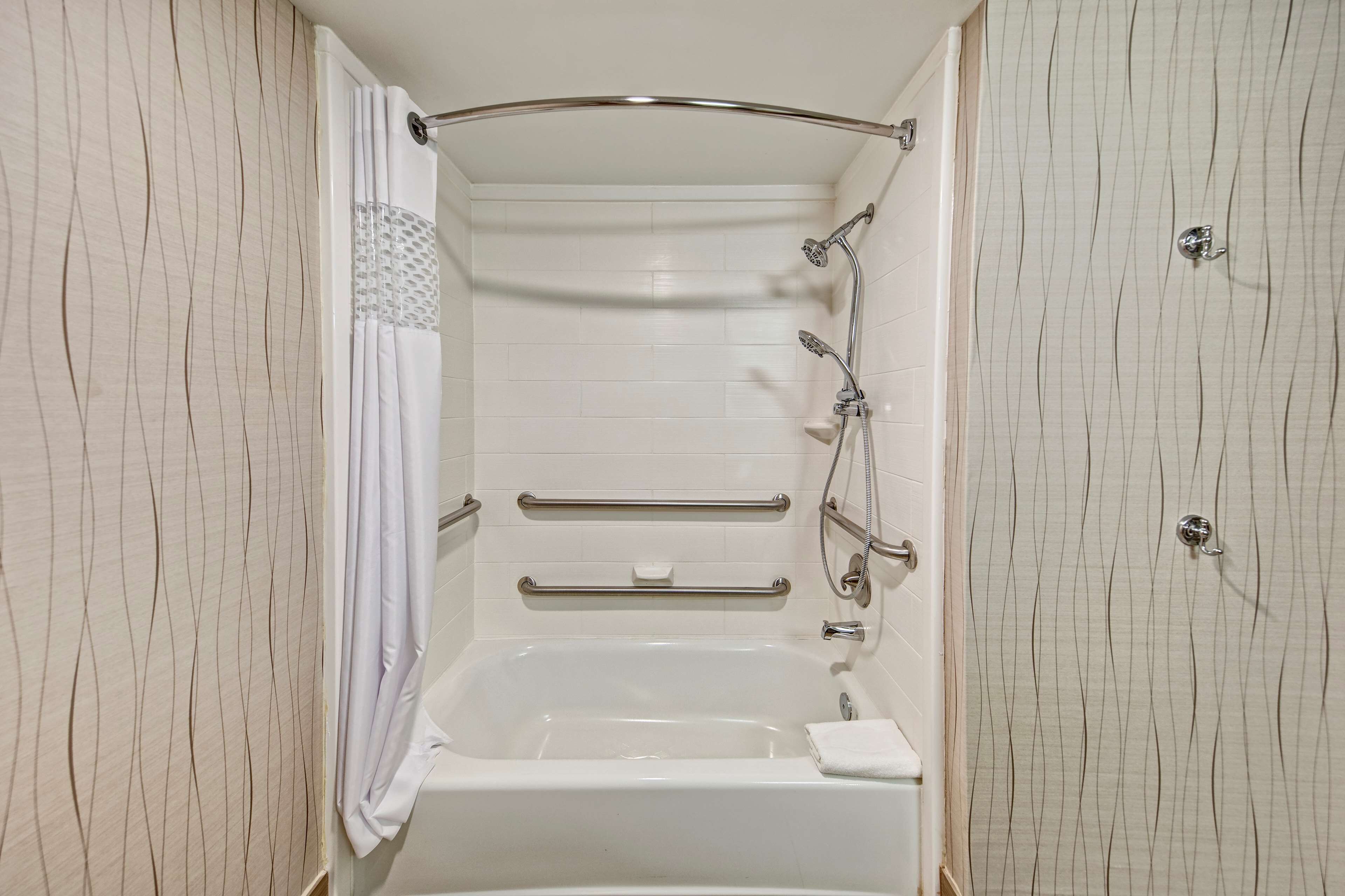 combined shower/bathtub, free toiletries, hair dryer, towels