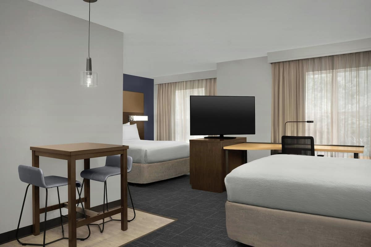 Premium bedding, pillowtop beds, desk, laptop workspace