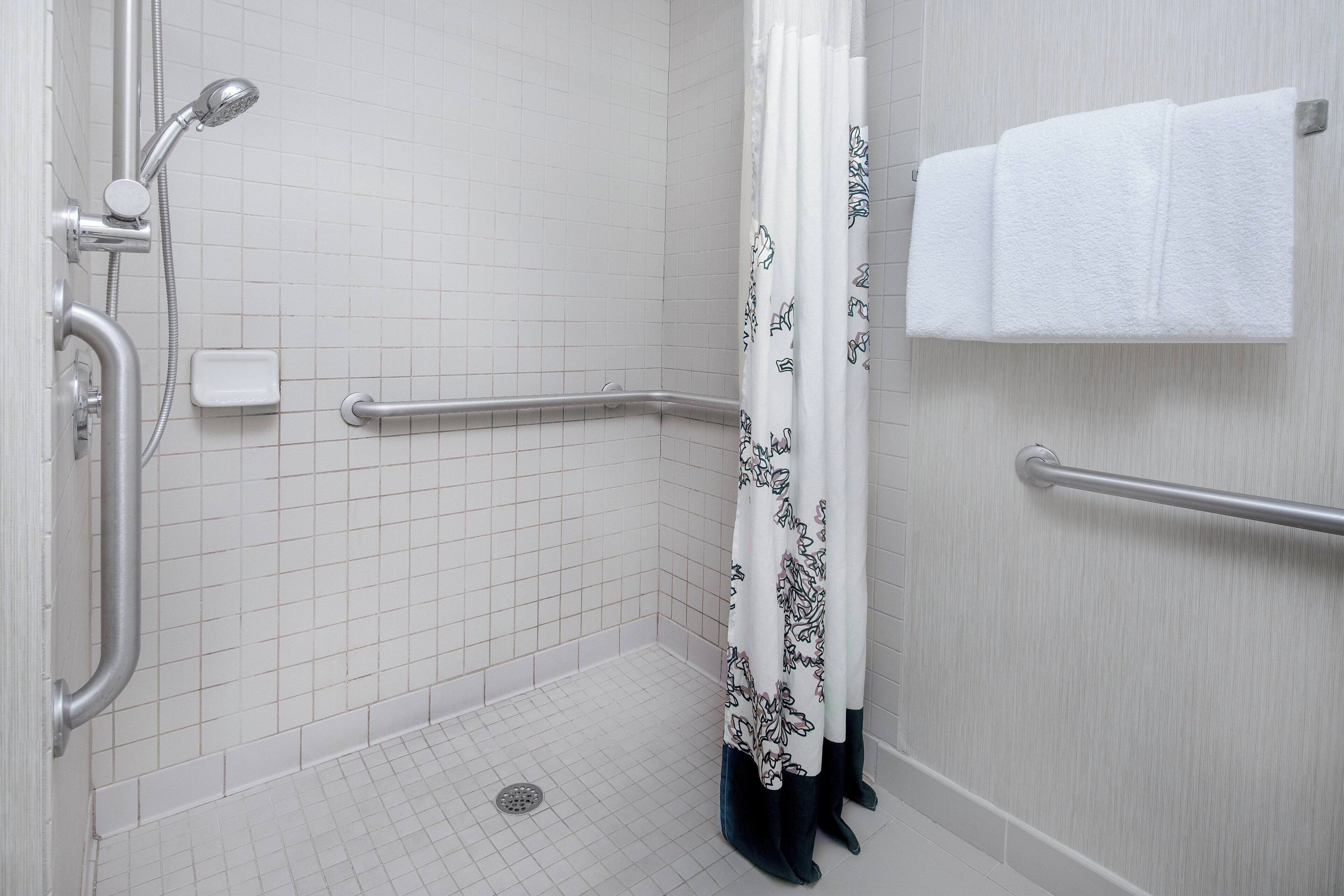 combined shower/bathtub, free toiletries, hair dryer, towels