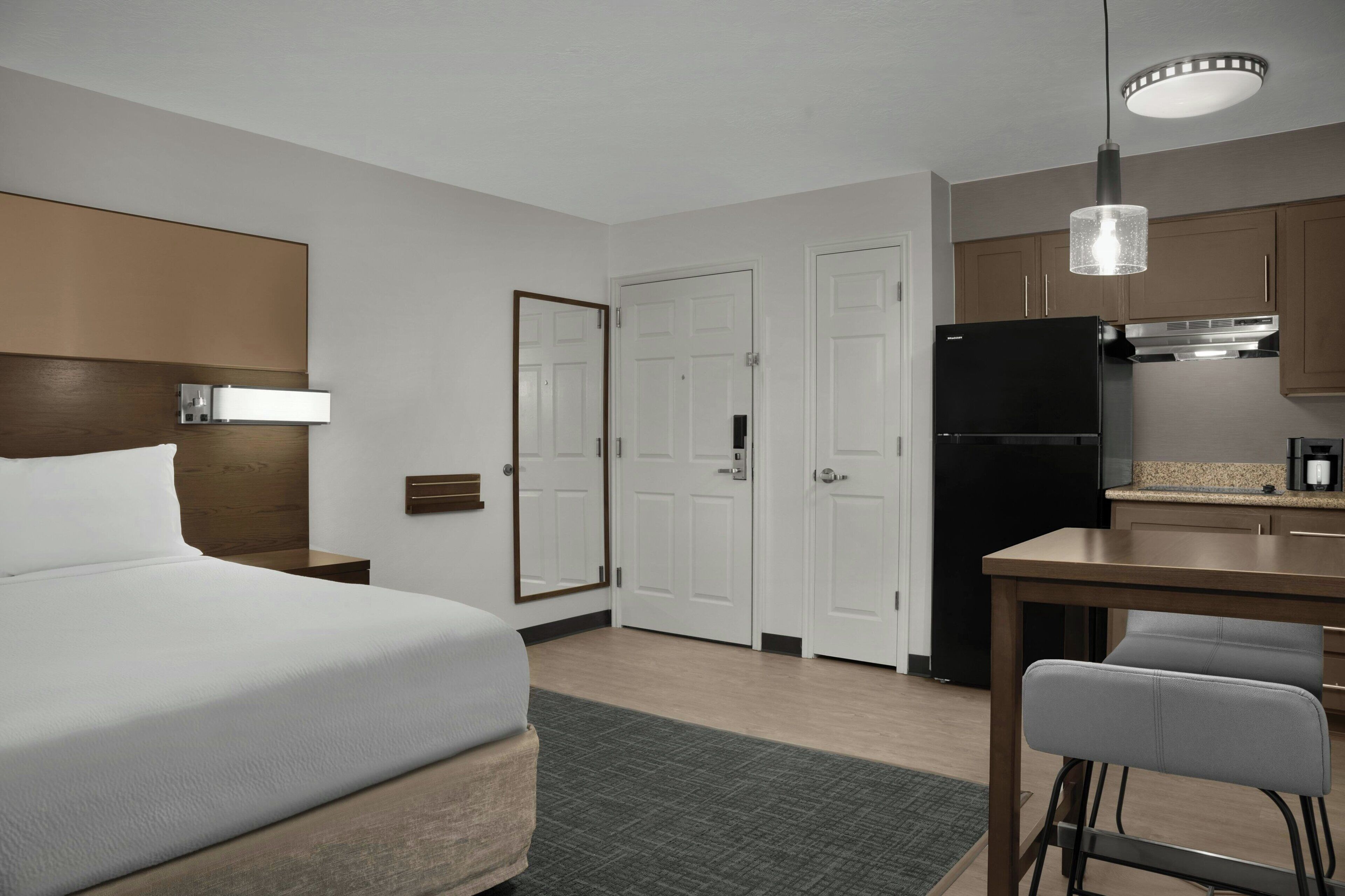 Premium bedding, pillowtop beds, desk, laptop workspace