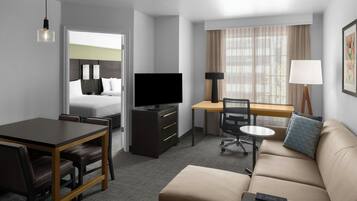 Suite, 1 Bedroom | Desk, laptop workspace, blackout curtains, iron/ironing board