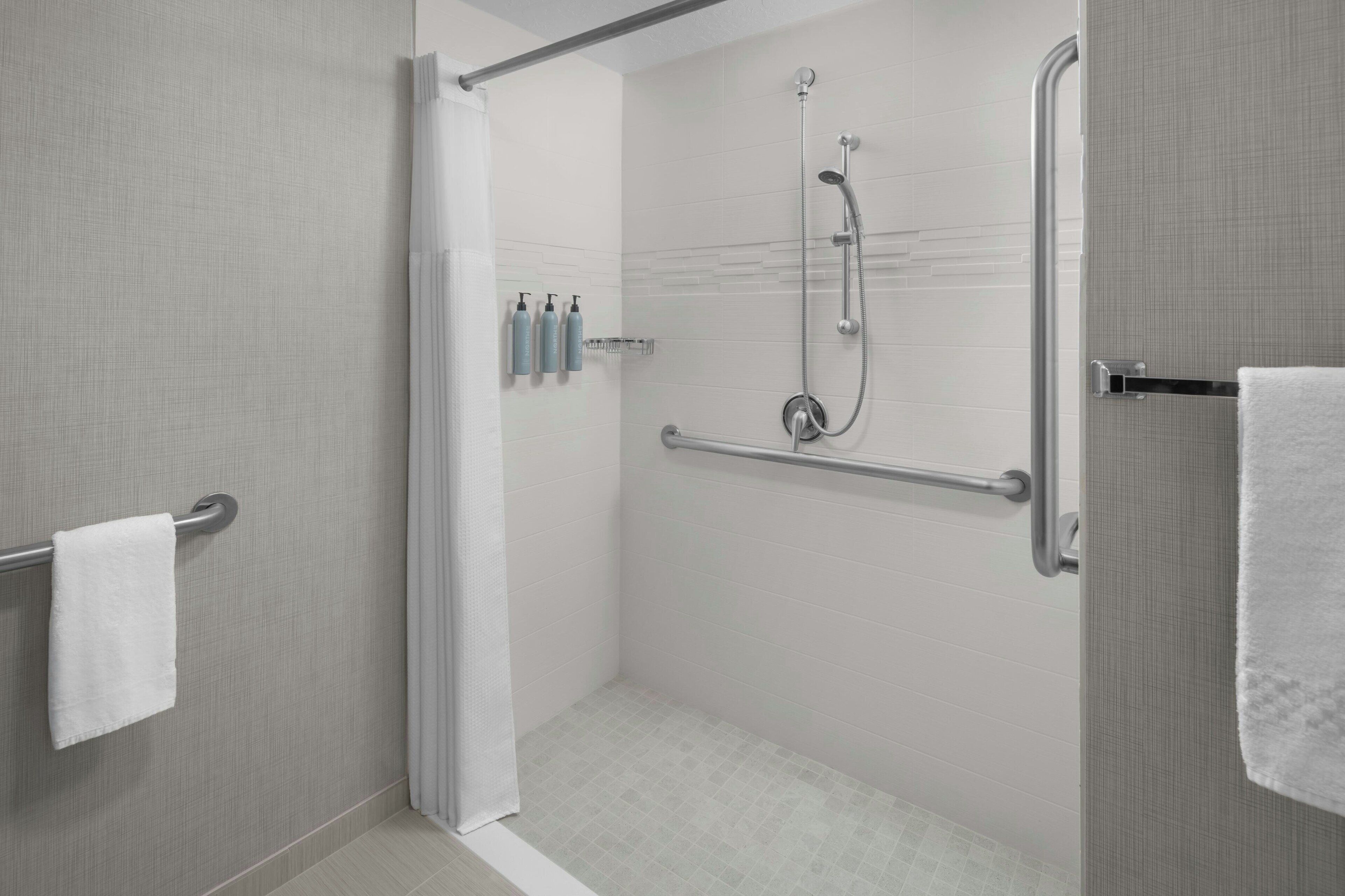 combined shower/bathtub, free toiletries, hair dryer, towels