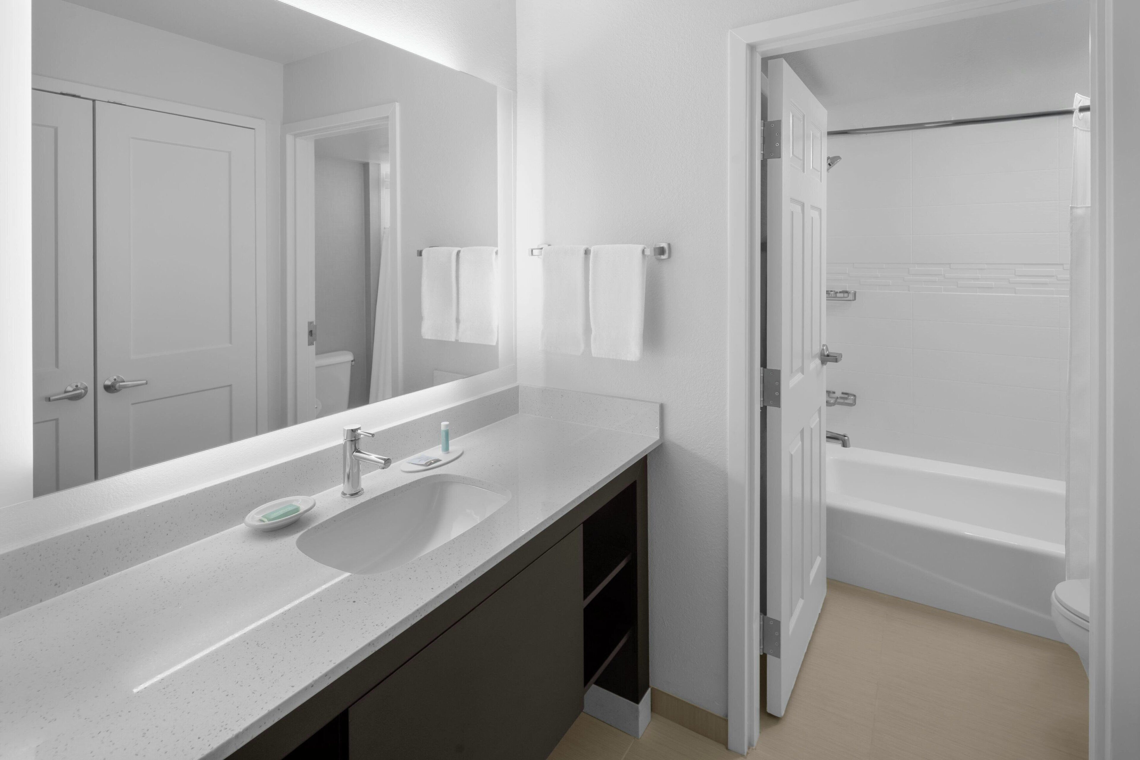 combined shower/bathtub, free toiletries, hair dryer, towels