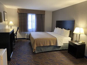 Desk, laptop workspace, blackout drapes, cribs/infant beds