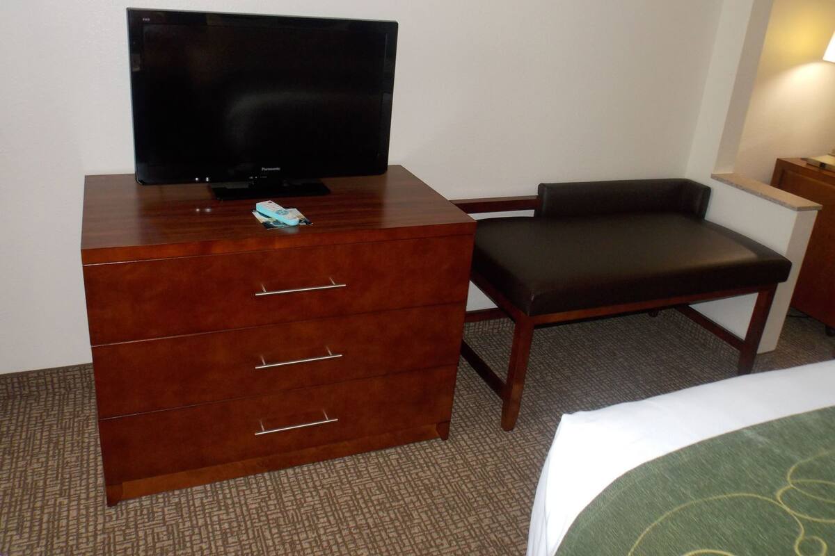 Desk, blackout drapes, iron/ironing board, free cribs/infant beds
