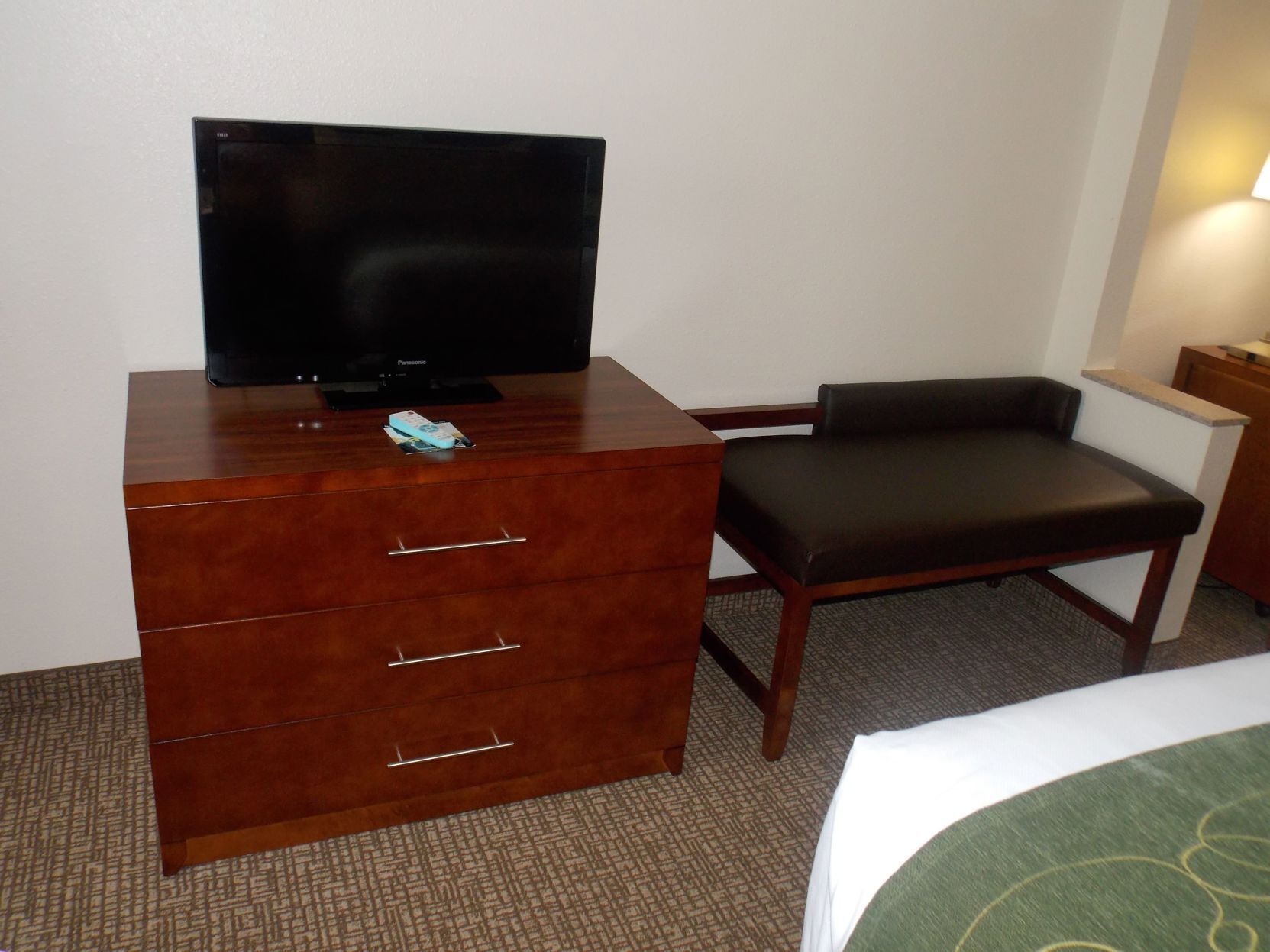 Desk, blackout drapes, iron/ironing board, free cribs/infant beds