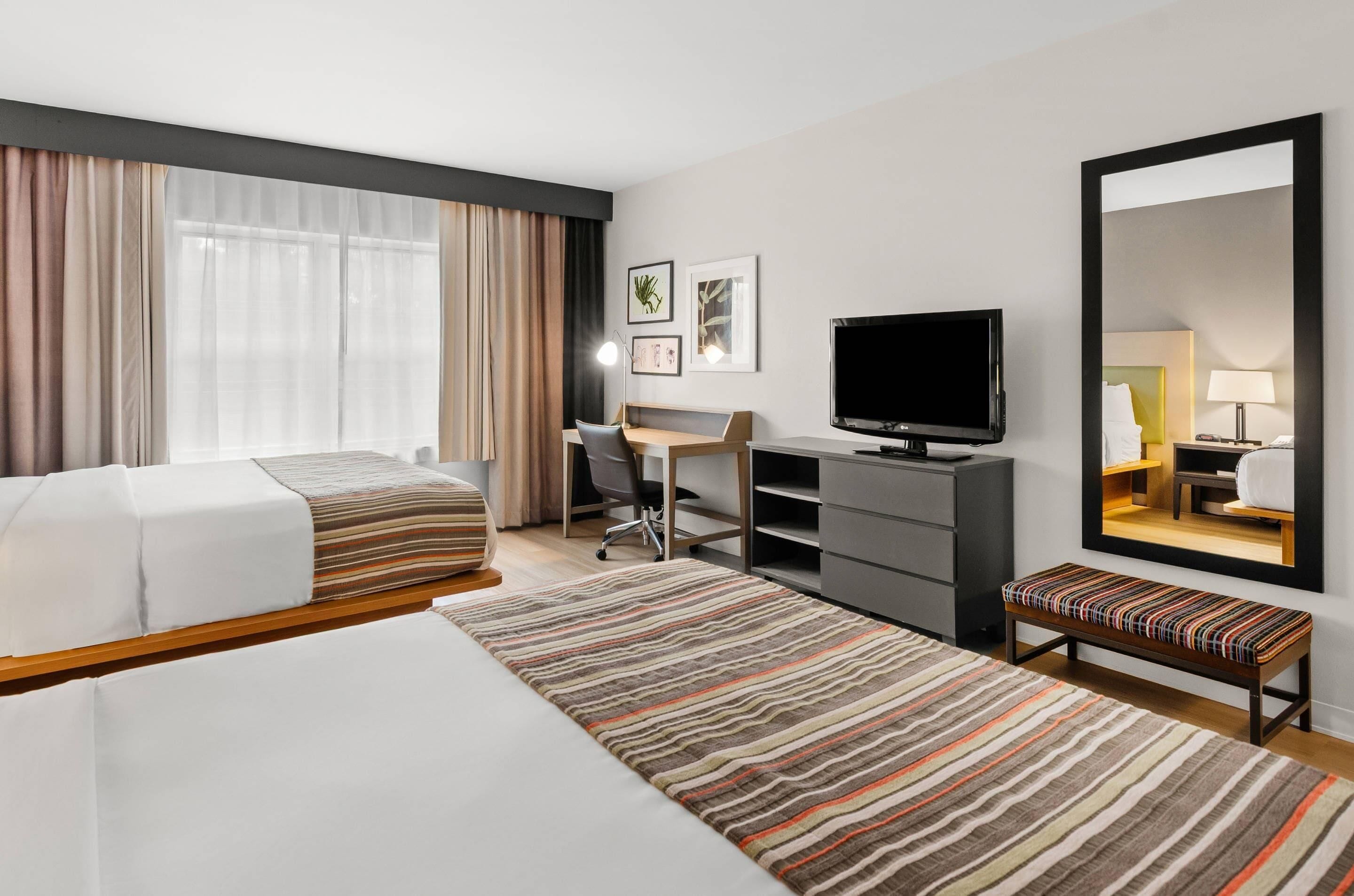 Room, 2 Queen Beds, Non Smoking | Hypo-allergenic bedding, down comforters, desk, iron/ironing board