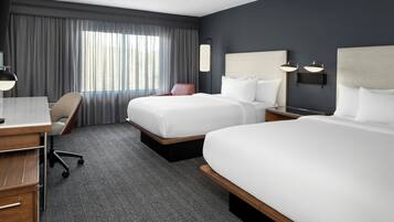 Premium bedding, down duvets, desk, laptop workspace