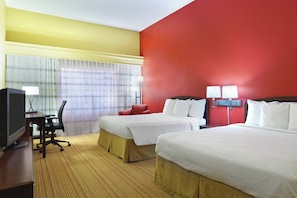 Premium bedding, down duvets, desk, laptop workspace