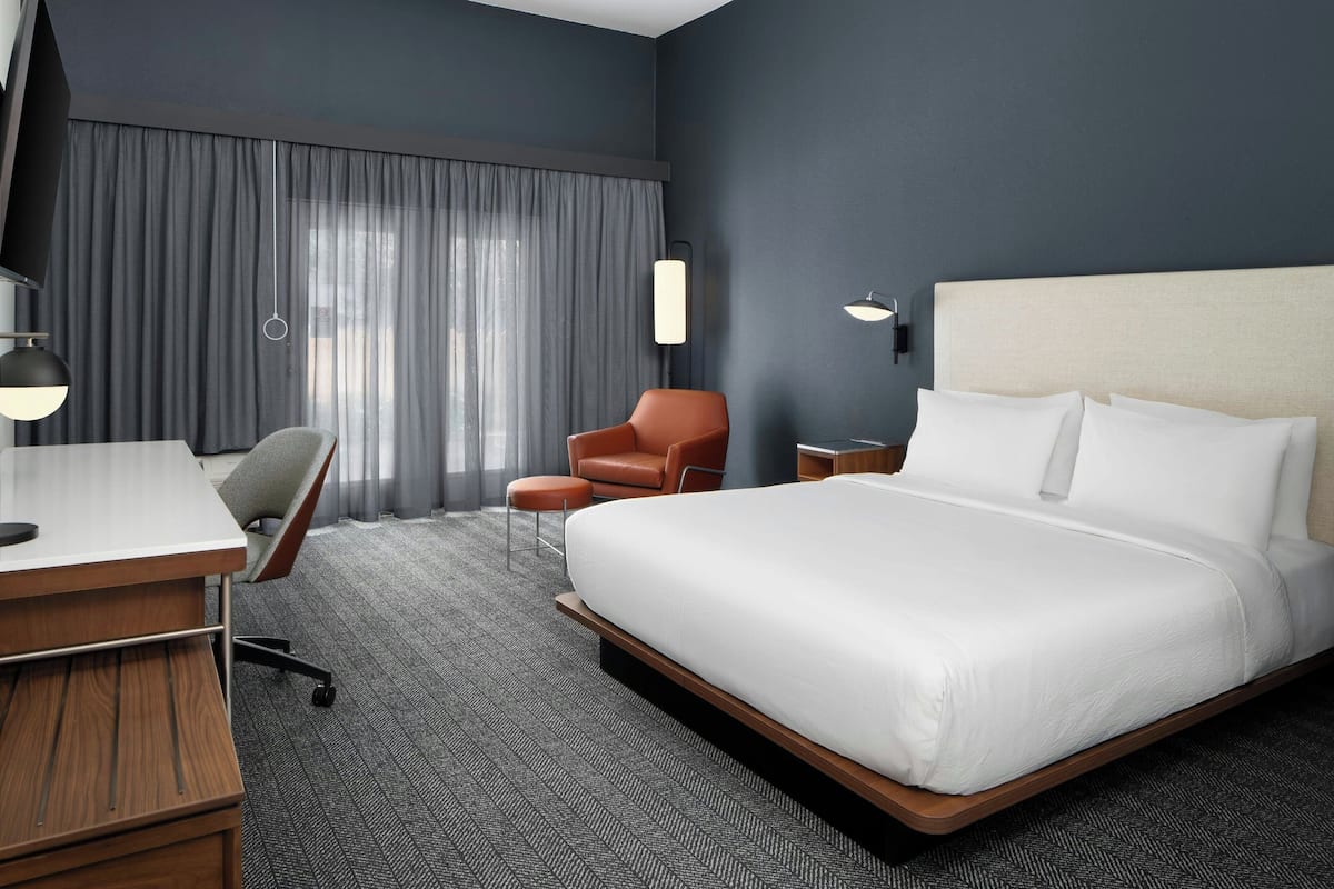 Premium bedding, down comforters, desk, laptop workspace