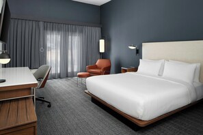 Premium bedding, down comforters, desk, laptop workspace